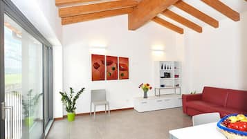 Appartamento familiare | Area soggiorno | TV a schermo piatto