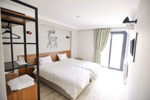 Standard Room | Minibar, in-room safe, iron/ironing board, free WiFi