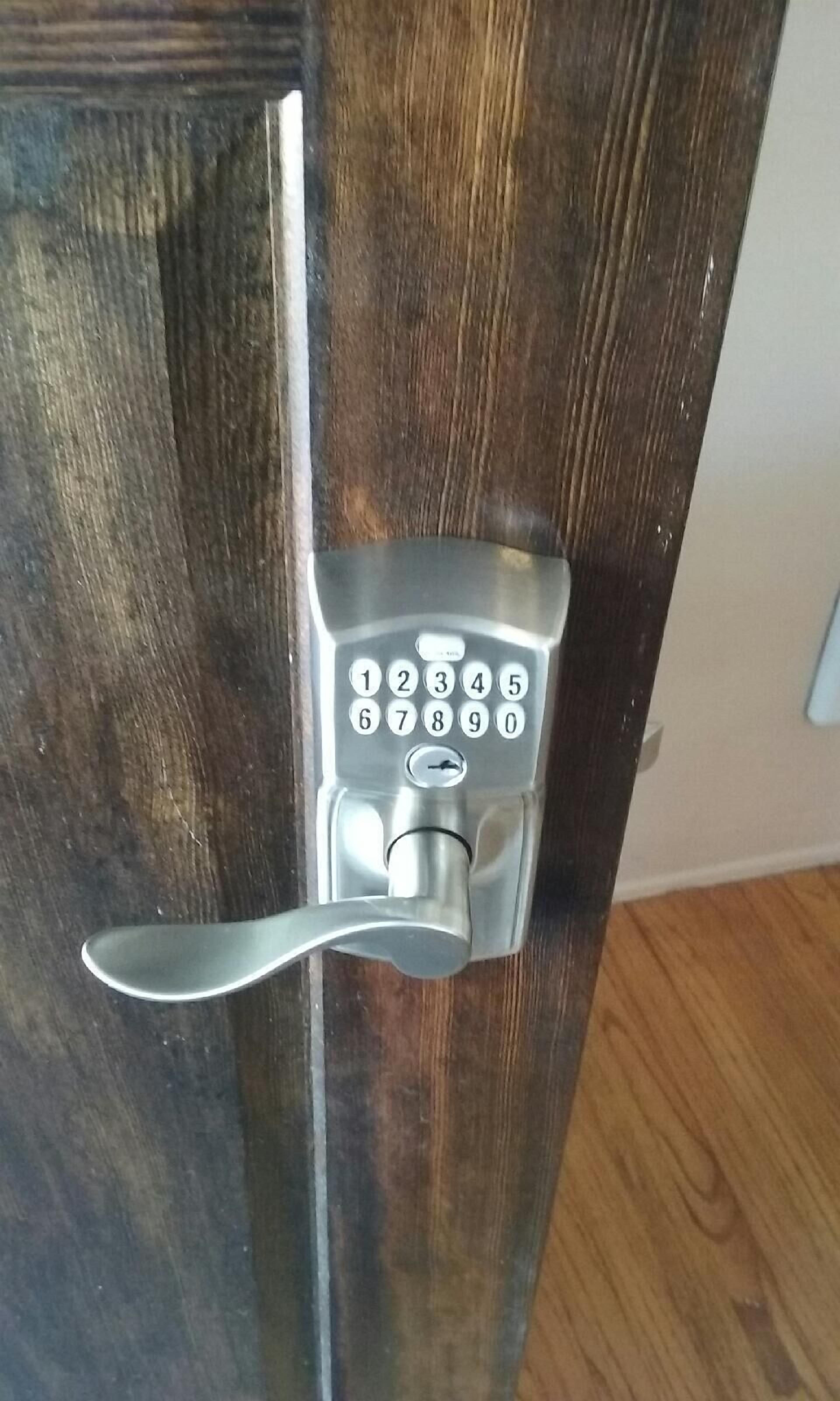 A door with a numeric keypad lock.