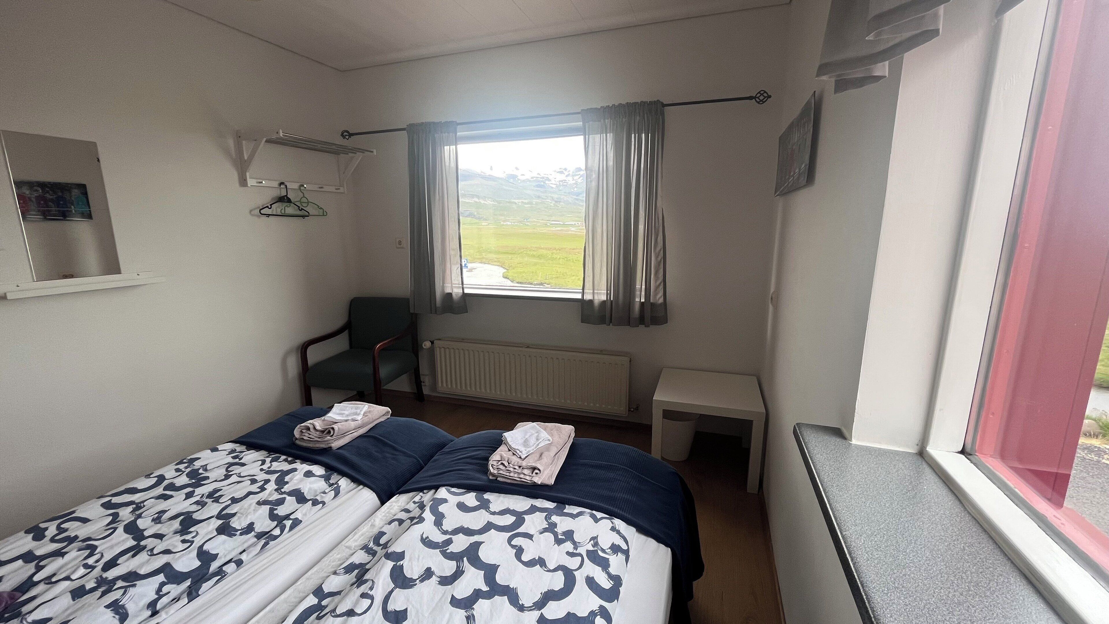 Economy Double or Twin Room, Shared Bathroom | Blackout drapes, cribs (free), WiFi (free), bed sheets