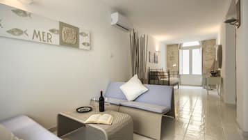 Deluxe Apartment | Ruang tamu | TV skrin rata