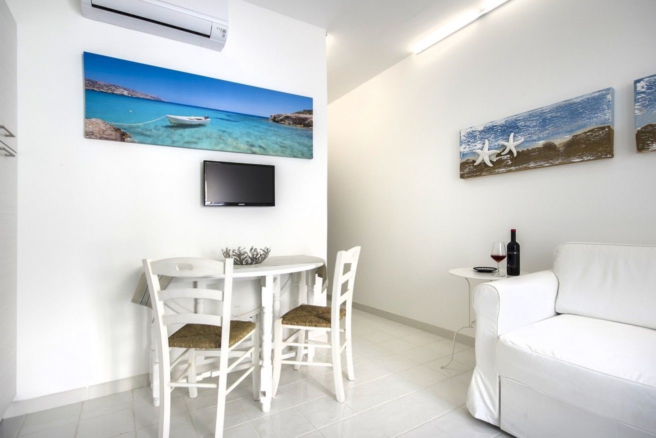 Superior Apartment | Living area | Flat-screen TV