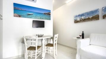 Superior Apartment | Living area | Flat-screen TV