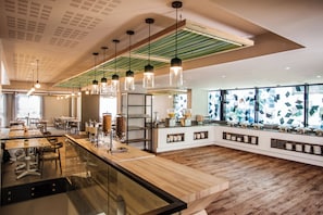 Breakfast, lunch, dinner served; local and international cuisine 