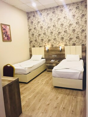 Economy Twin Room | Premium bedding, free minibar, laptop workspace, iron/ironing board - Gulizar Otel (Sanliurfa)