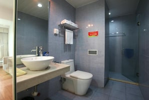 Shower, free toiletries, hair dryer, slippers