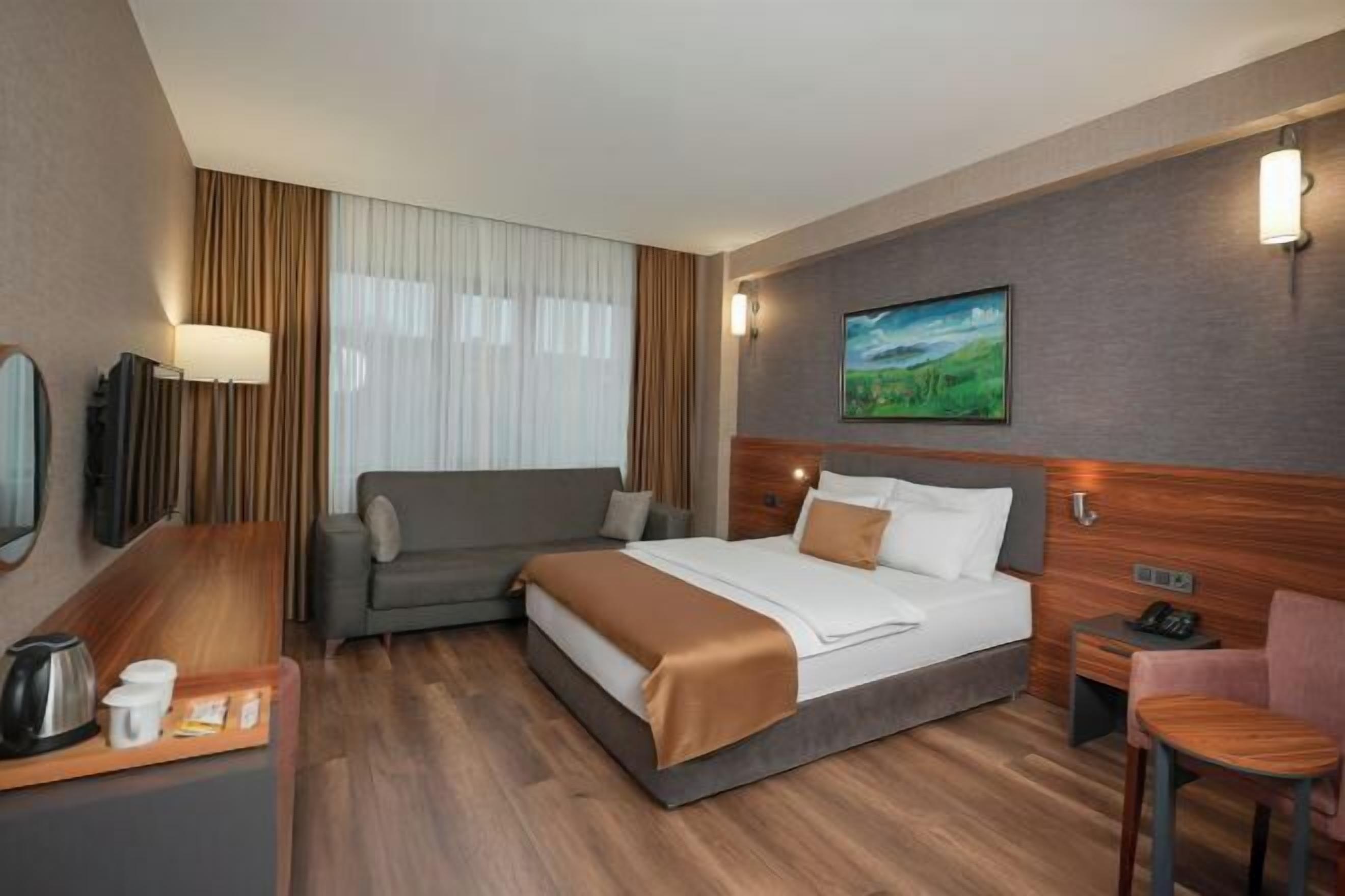 Premium bedding, minibar, in-room safe, laptop workspace