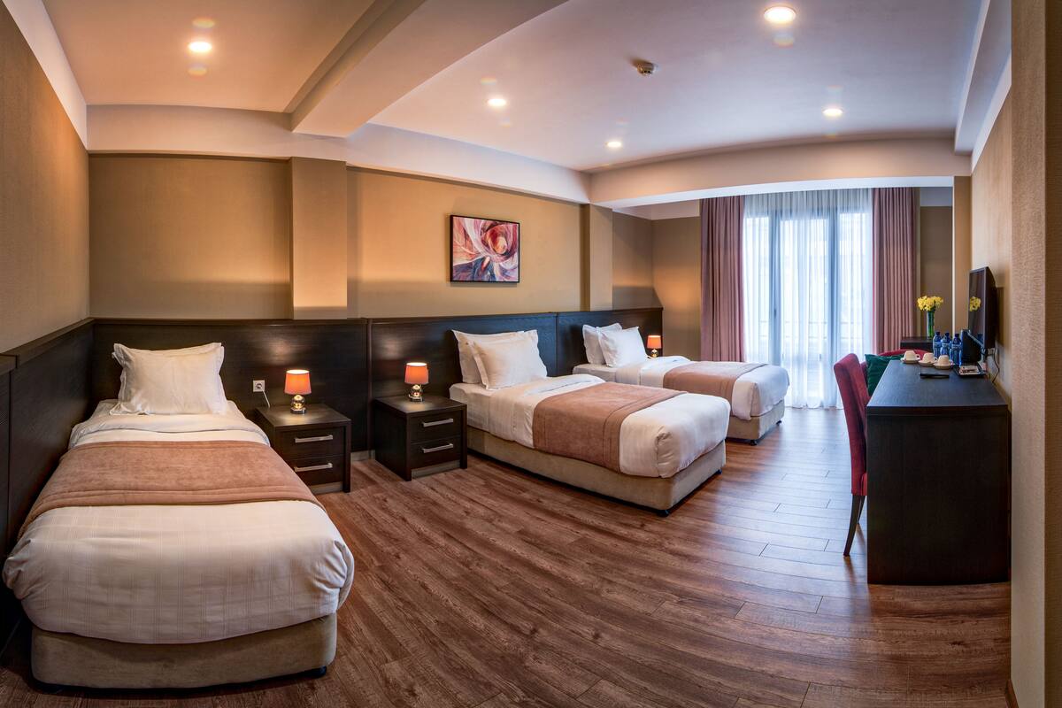 Standard Triple Room, 3 Twin Beds, Non Smoking | 1 bedroom, hypo-allergenic bedding available, desk, blackout drapes
