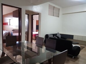 Superior Annex, 2 Bedrooms | Living area | 32-inch LED TV with cable channels, TV - TSC Suites by Eastland Residences (Cebu City)