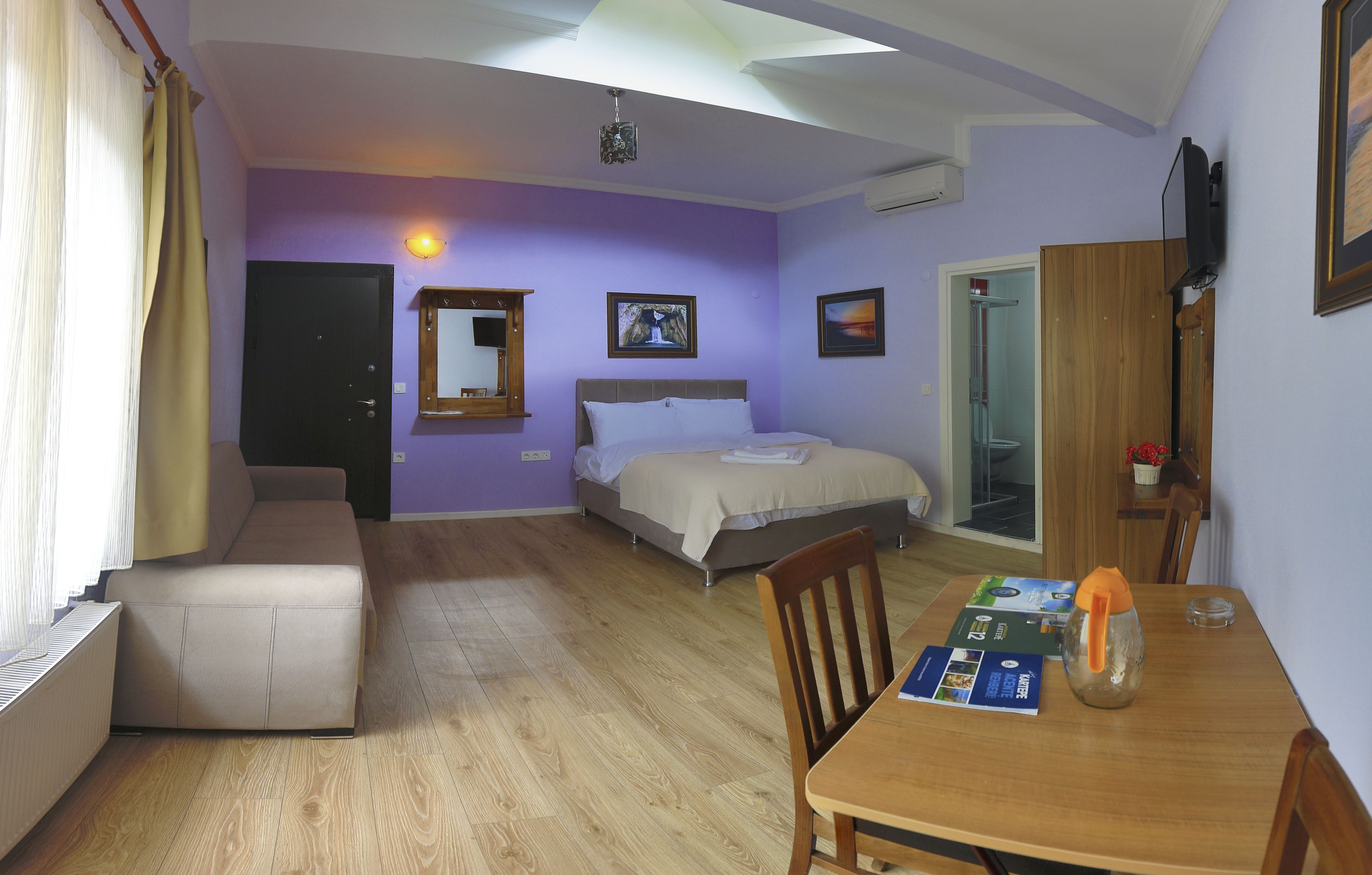 basic quadruple room | bathroom | shower, free toiletries, hair dryer, slippers