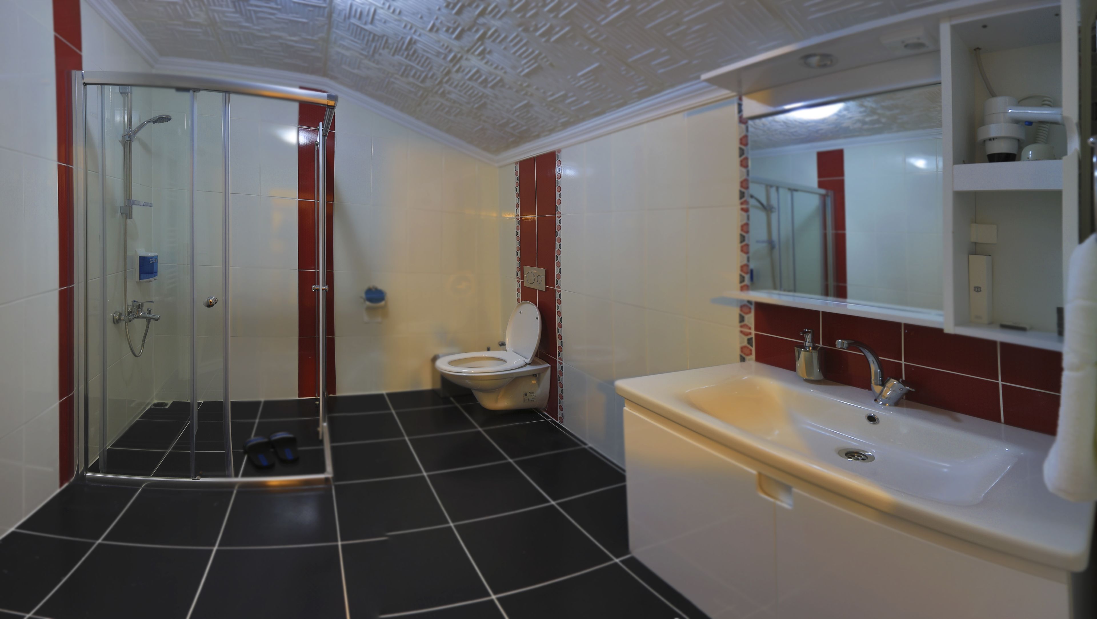 shower, free toiletries, hair dryer, slippers