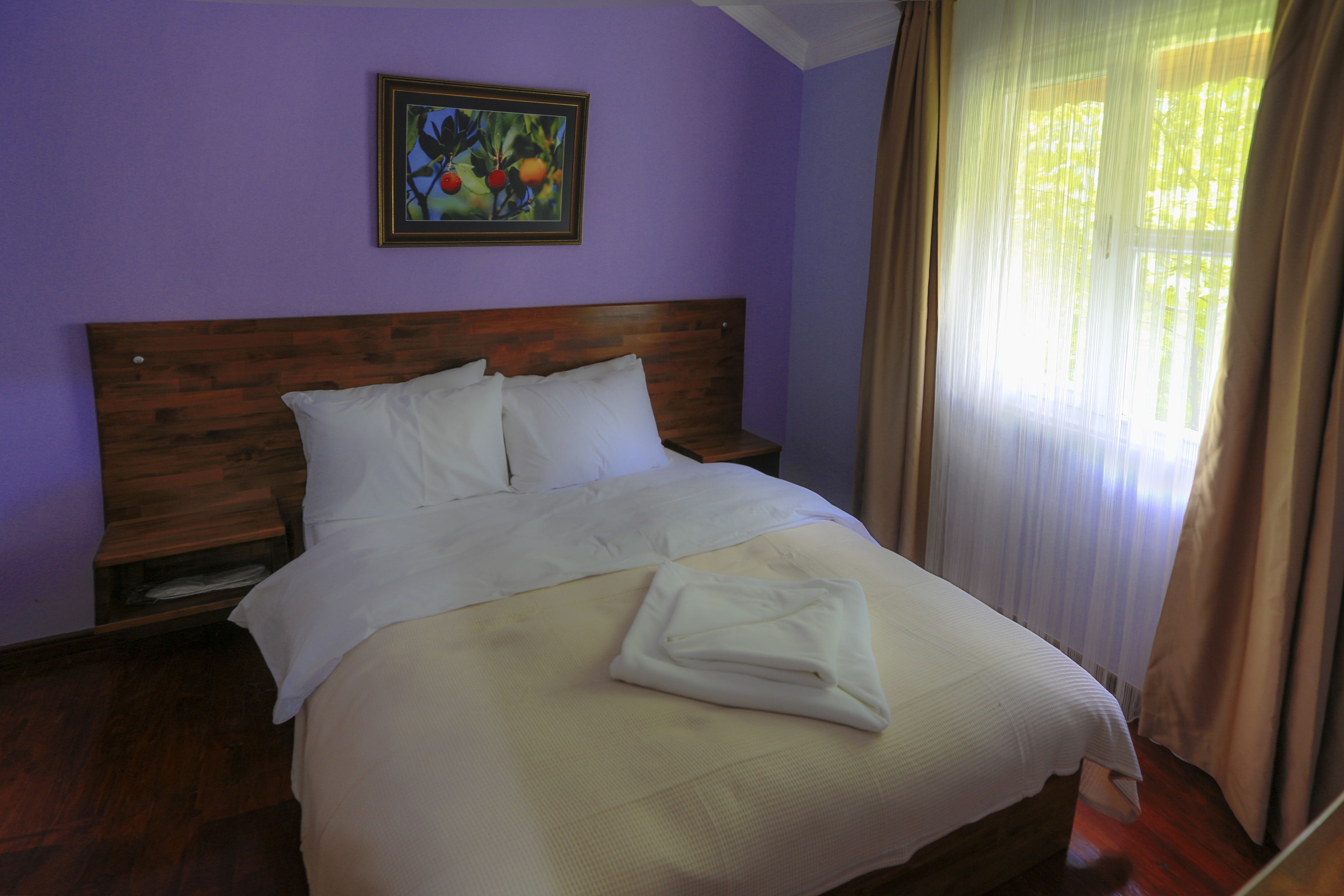 family room, garden view | 1 bedroom, egyptian cotton sheets, premium bedding, blackout curtains