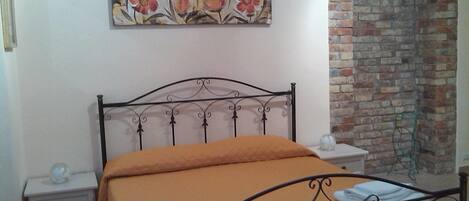 Chambre Quadruple Deluxe | Bureau, chambres insonorisées, fer et planche à repasser, Wi-Fi gratuit
