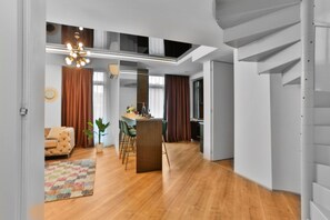 Duplex Apartment | Living area | 128-cm Smart TV with cable channels, TV