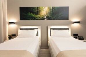 Literie de qualité supérieure, coffres-forts dans les chambres