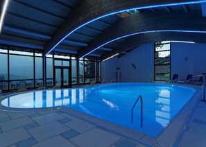 Indoor pool, open 7 AM to 8:00 PM, pool loungers