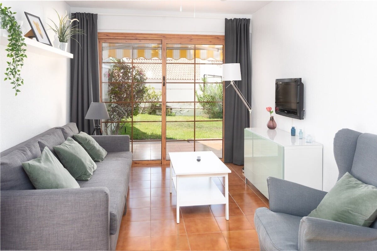 Standard One Bedroom | Living area | Flat-screen TV