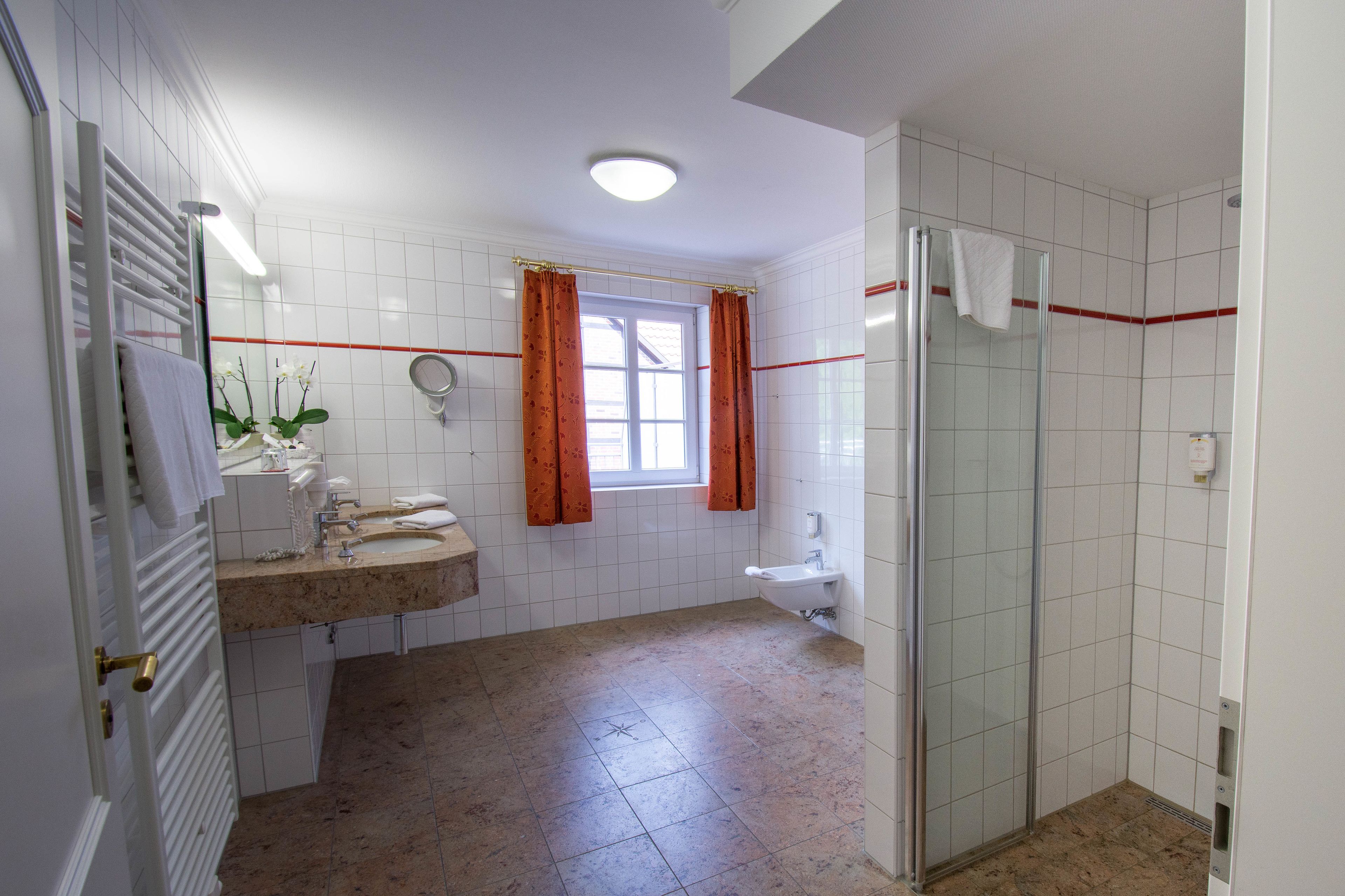 shower, free toiletries, hair dryer, dressing gowns