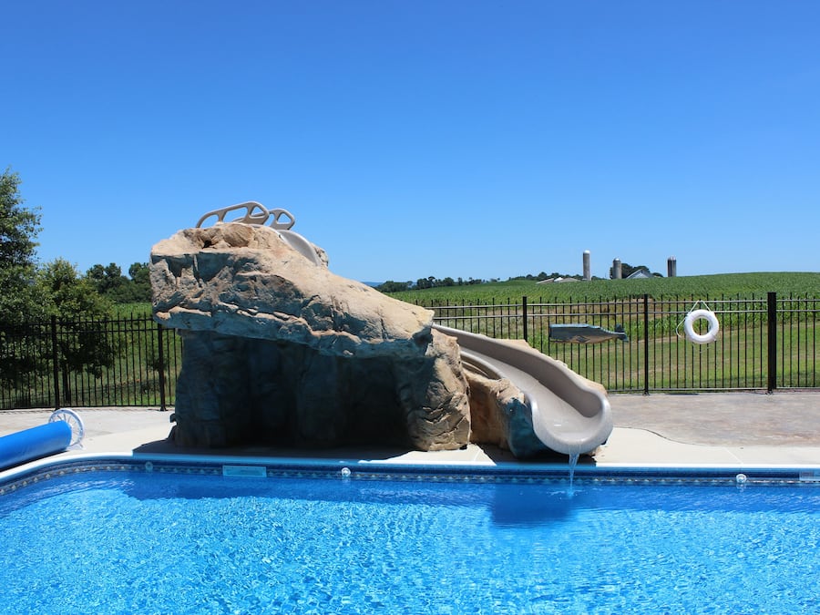 Seasonal outdoor pool, pool umbrellas, pool loungers