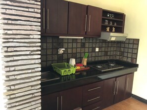 Fridge, microwave, stovetop, coffee/tea maker