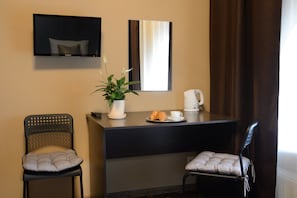 Desk, blackout curtains, soundproofing, iron/ironing board
