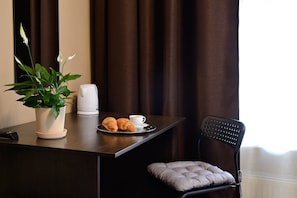 Desk, blackout curtains, soundproofing, iron/ironing board