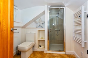 Bathroom | Shower, hair dryer, towels, toilet paper