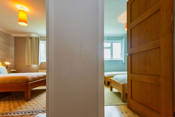 4 bedrooms, blackout drapes, iron/ironing board, free cribs/infant beds