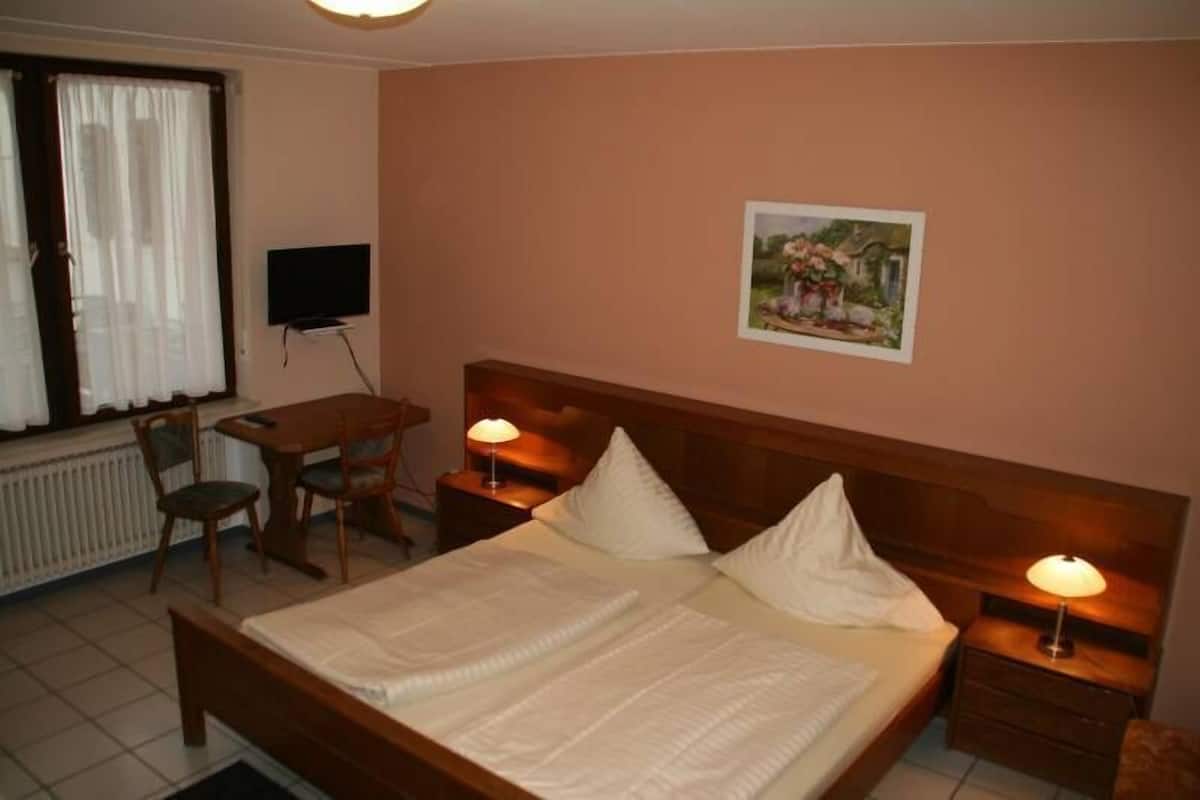 Desk, free WiFi, bed sheets