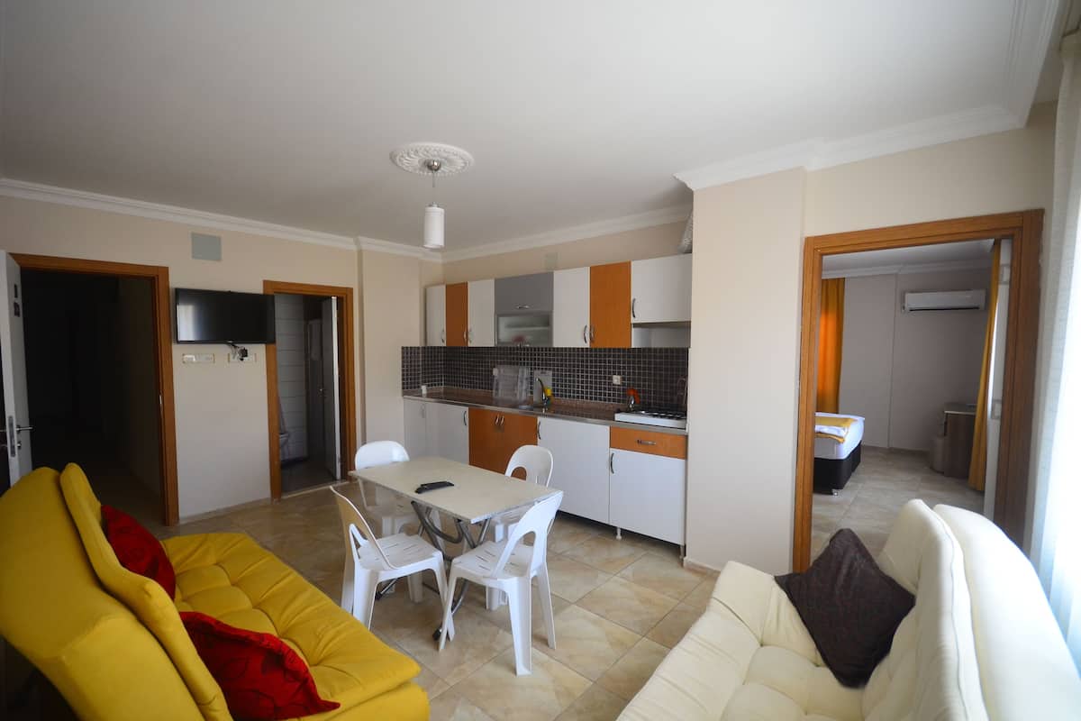 Apartment, 1 Bedroom | Living area | LCD TV