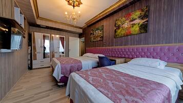 Suite Keluarga | Minibar, meja kerja, kedap suara, dan setrika/meja setrika