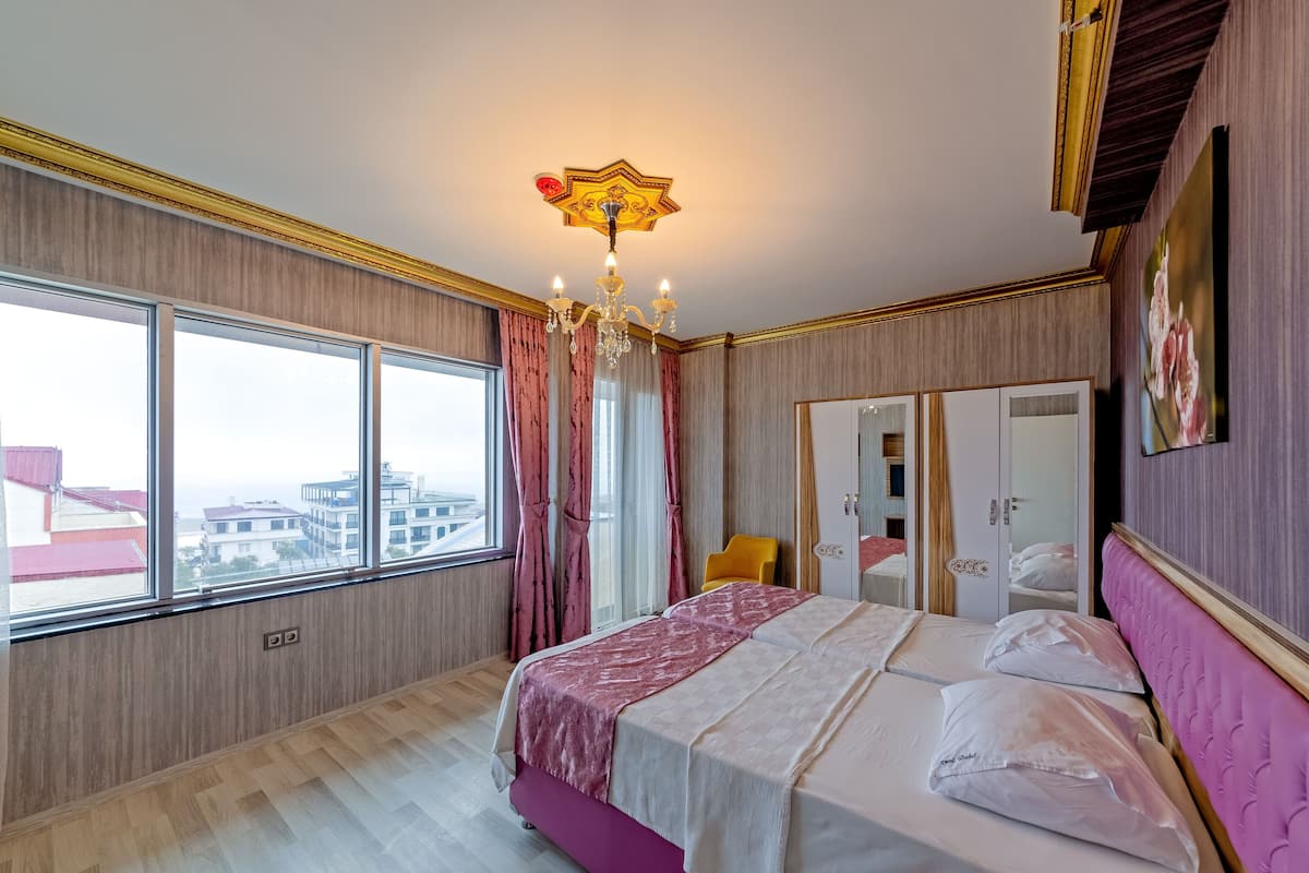 Apartamento luxo, vista para o mar | Frigobar, escrivaninha, quartos à prova de som