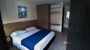 Quarto conforto, 1 cama Queen | Roupa de cama