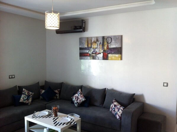 Deluxe appartement | Woonruimte | Flatscreentelevisie