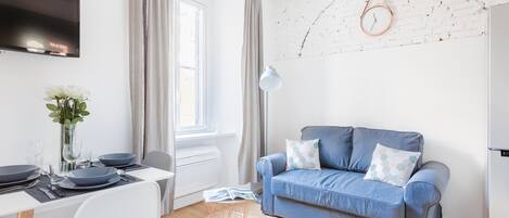 Apartment (1 Bedroom) | Living area | Flat-screen TV