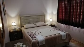 2 bedrooms, blackout curtains, iron/ironing board, free WiFi