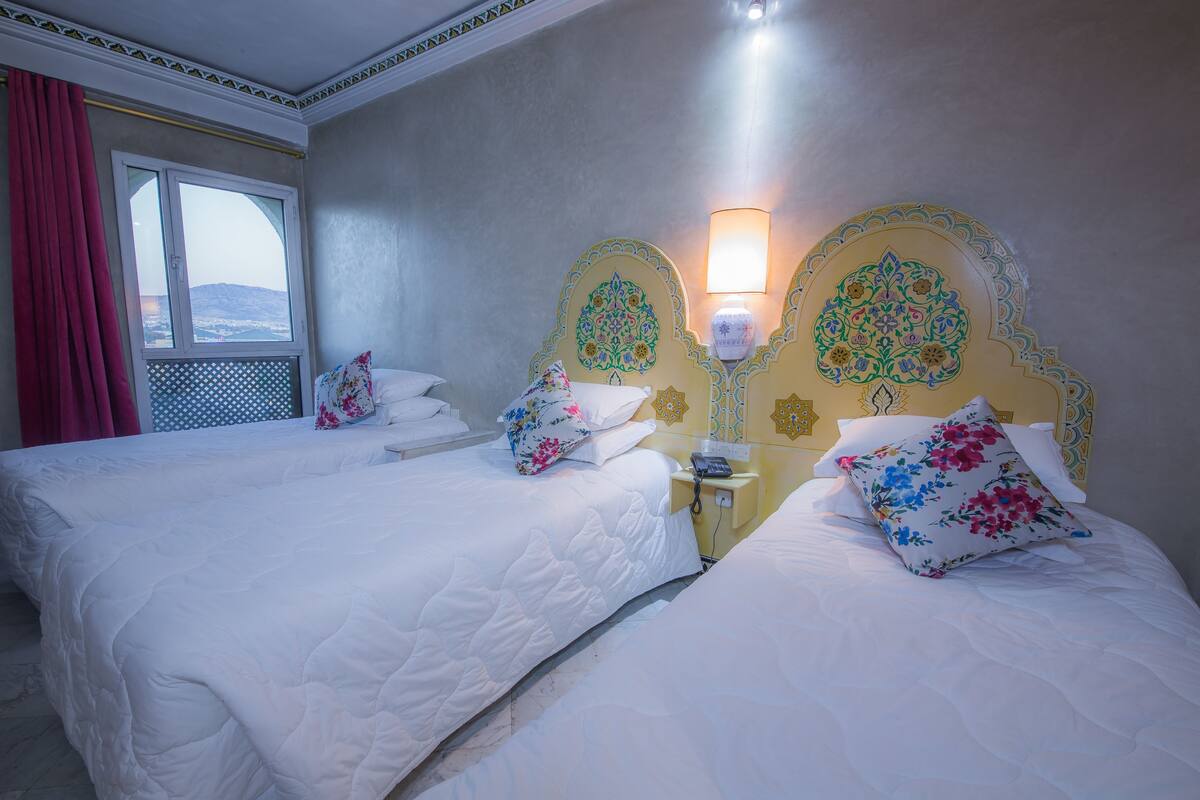 Comfort Triple Room | Minibar, in-room safe, desk, blackout curtains