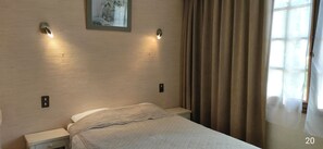 Luxe beddengoed, een kluis op de kamer, verduisterende gordijnen