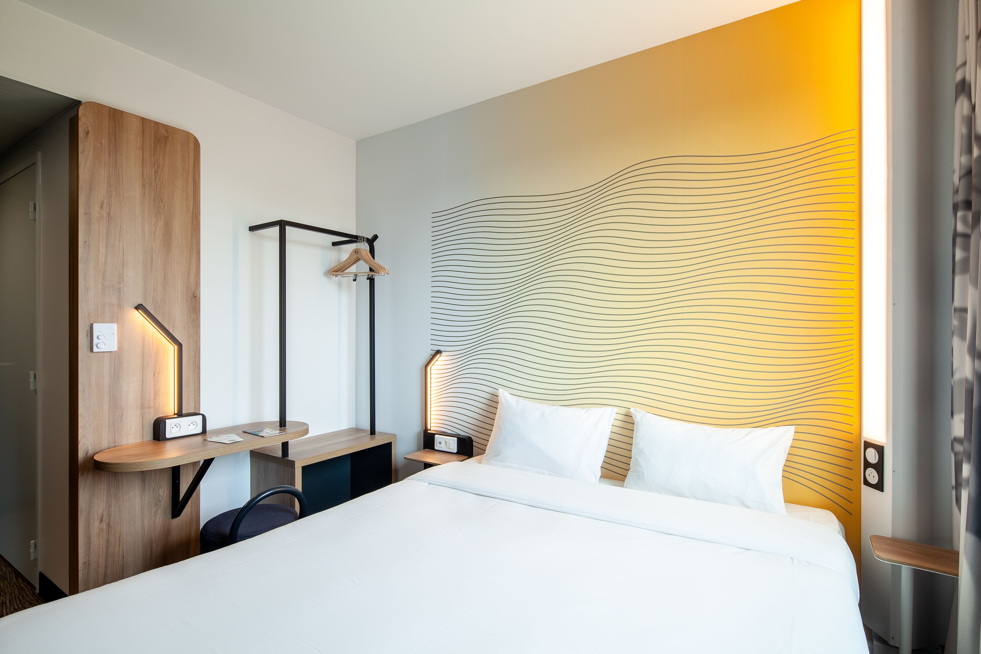 Premium bedding, desk, blackout curtains, soundproofing