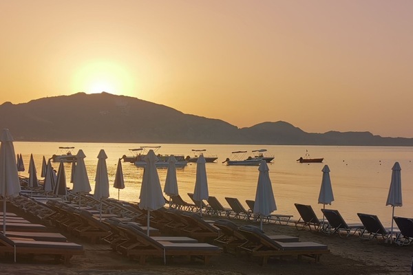 On the beach, sun loungers, beach umbrellas, beach bar