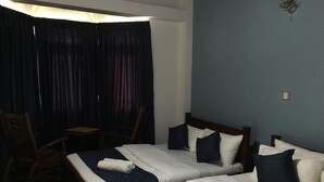 Draps en coton égyptien, minibar, coffres-forts dans les chambres
