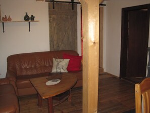 House | Living area | 32-inch TV with satellite channels, fireplace, DVD player - Ferienhaus Becker (Roedental)