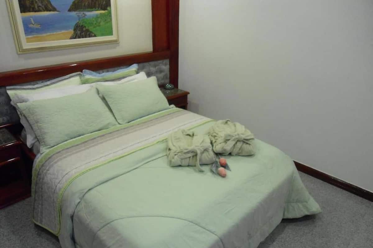 Habitación individual | 1 dormitorio, minibar, escritorio y cortinas opacas