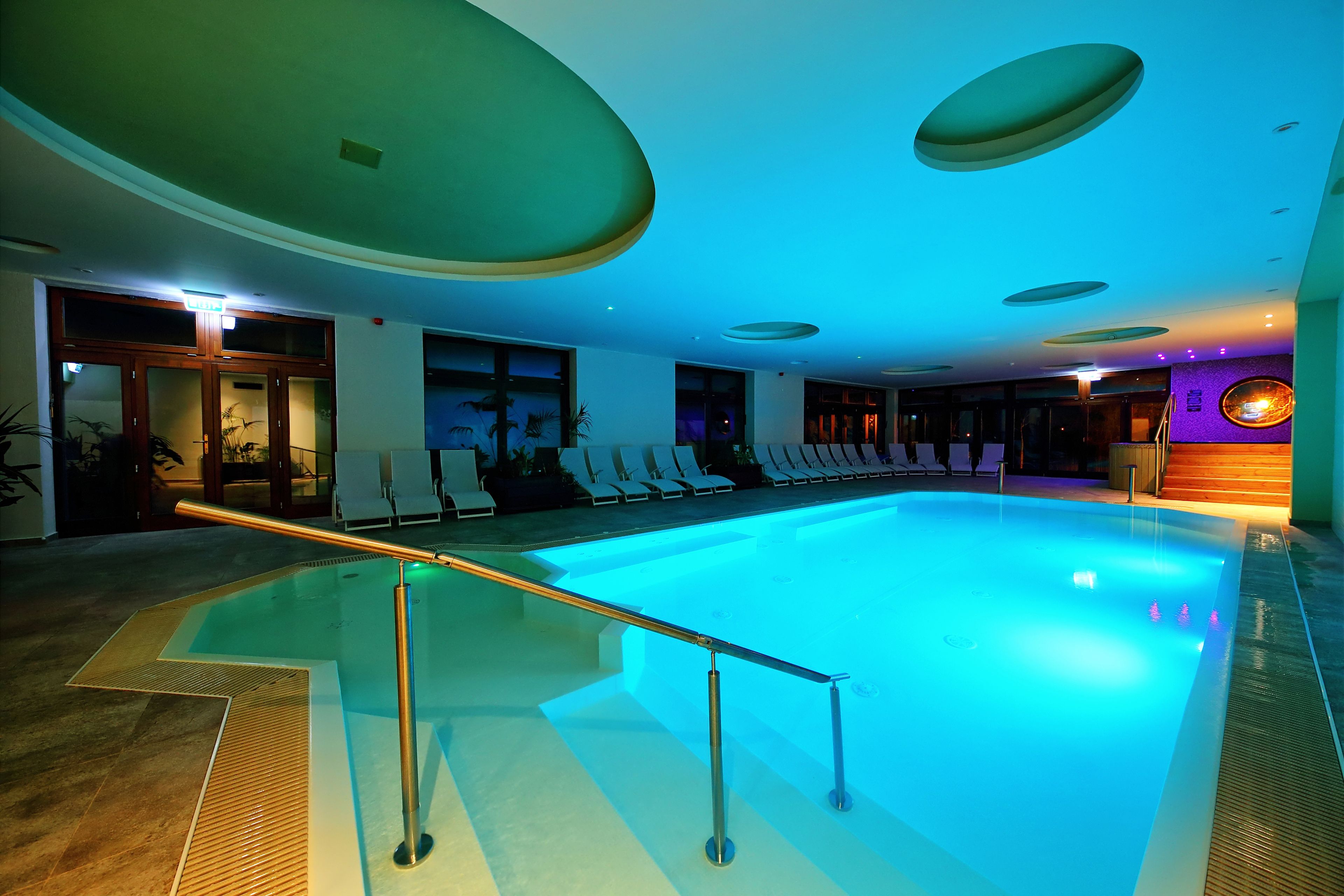 Indoor pool, open 9:00 AM to 10:00 PM, sun loungers
