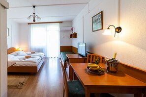 Superior Triple Room, Non Smoking | Minibar, in-room safe, free WiFi, bed sheets - Hotel Napfény (Zalakaros)