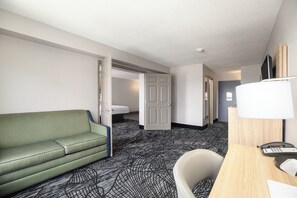 Suite, Multiple Beds, Non Smoking | Living area | Flat-screen TV - Days Inn & Suites by Wyndham Norton Shores/Muskegon (Muskegon)