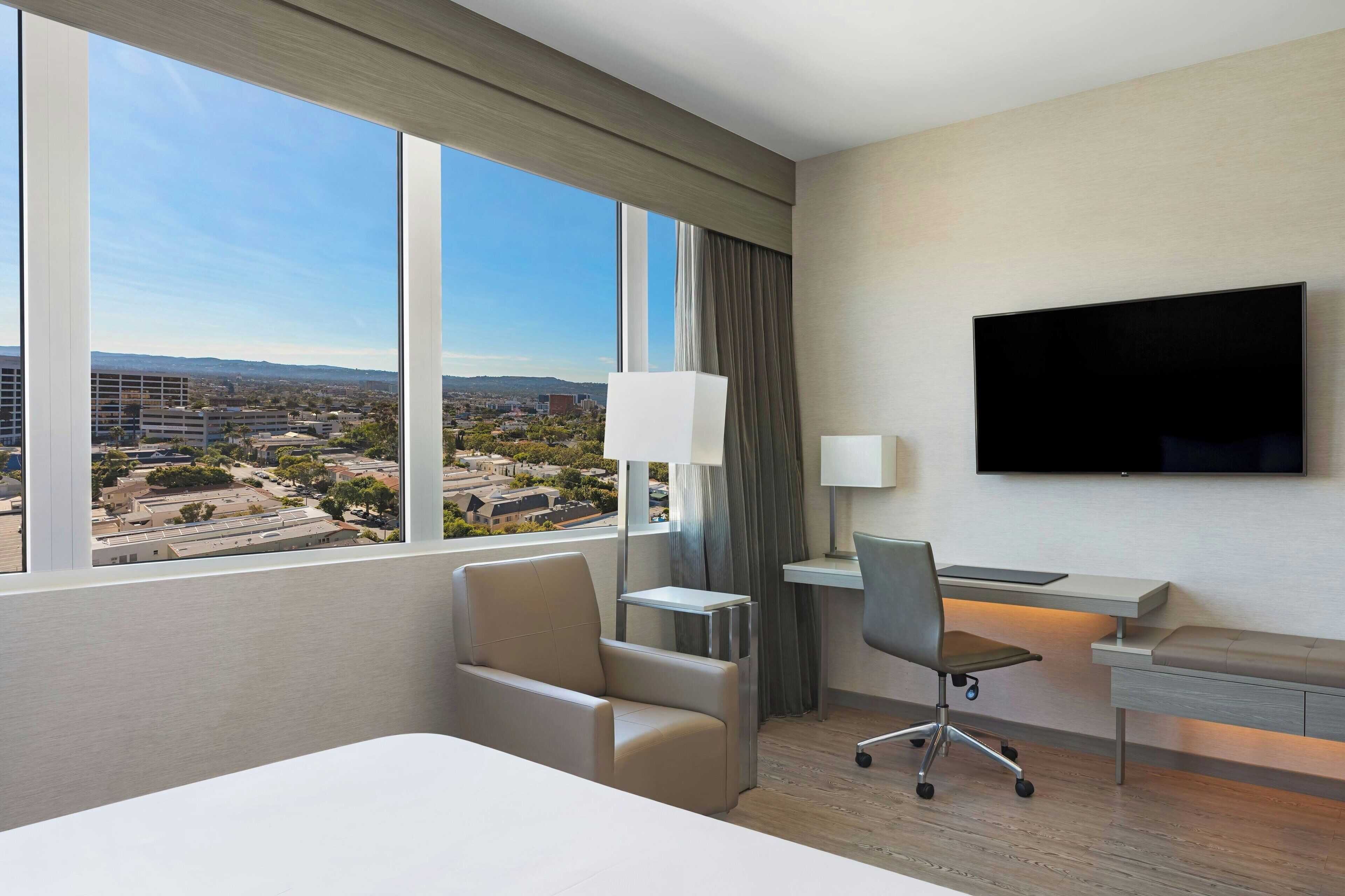 room, 2 queen beds, non smoking, city view | premium bedding, in-room safe, desk, laptop workspace