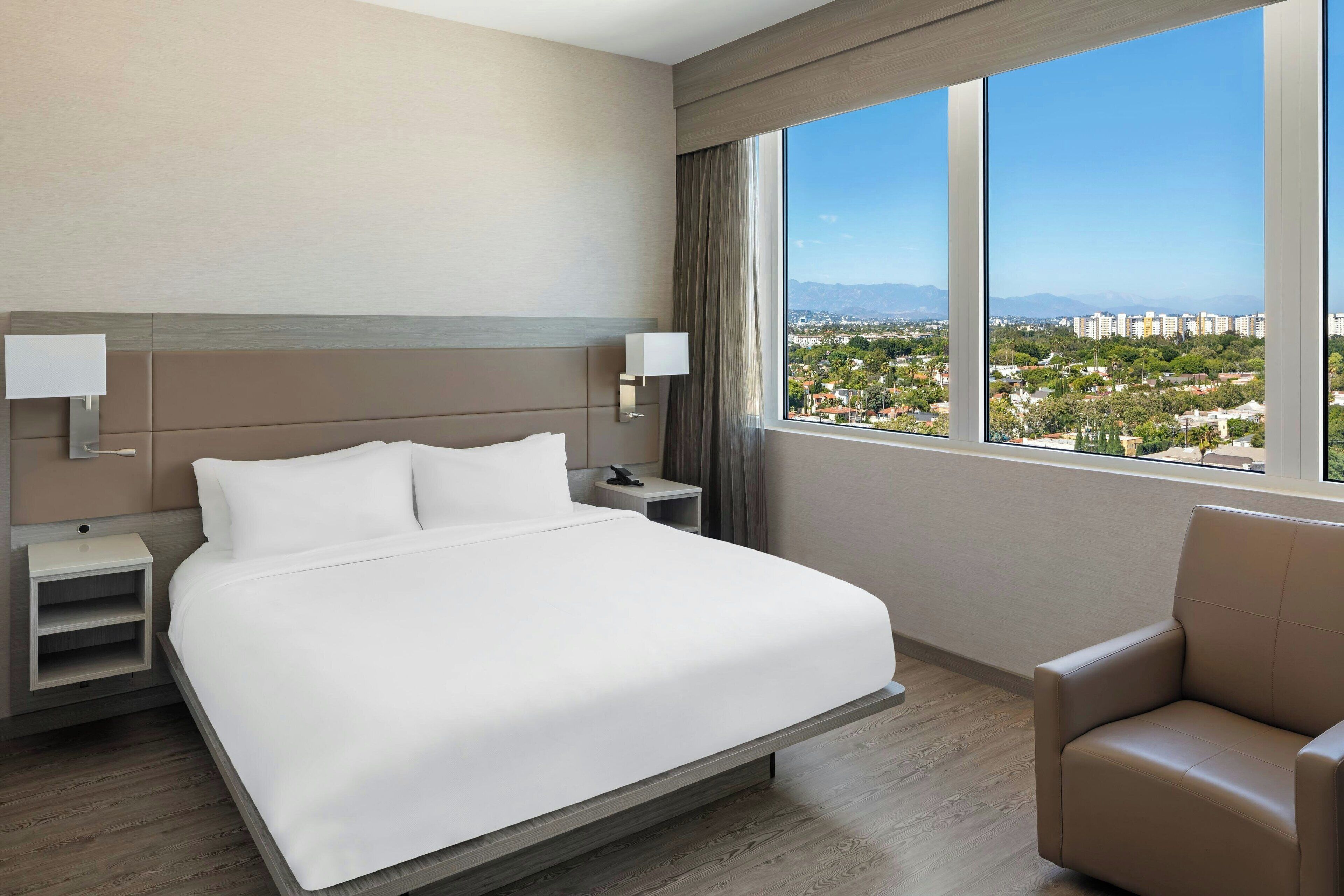 Room, 1 King Bed, City View | Premium bedding, in-room safe, desk, laptop workspace