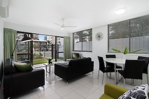 Comfort Apartment, 2 Bedrooms, Beachside | Living area | Flat-screen TV - Jansea 2 (Broadbeach)