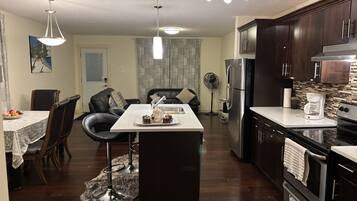 Coffee/tea maker, fridge, microwave, oven